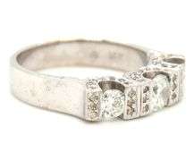 14kt White gold 0.85ctw 3 stone diamond ring