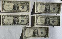 Five $1 1935E Near Unc Silver Certificates.