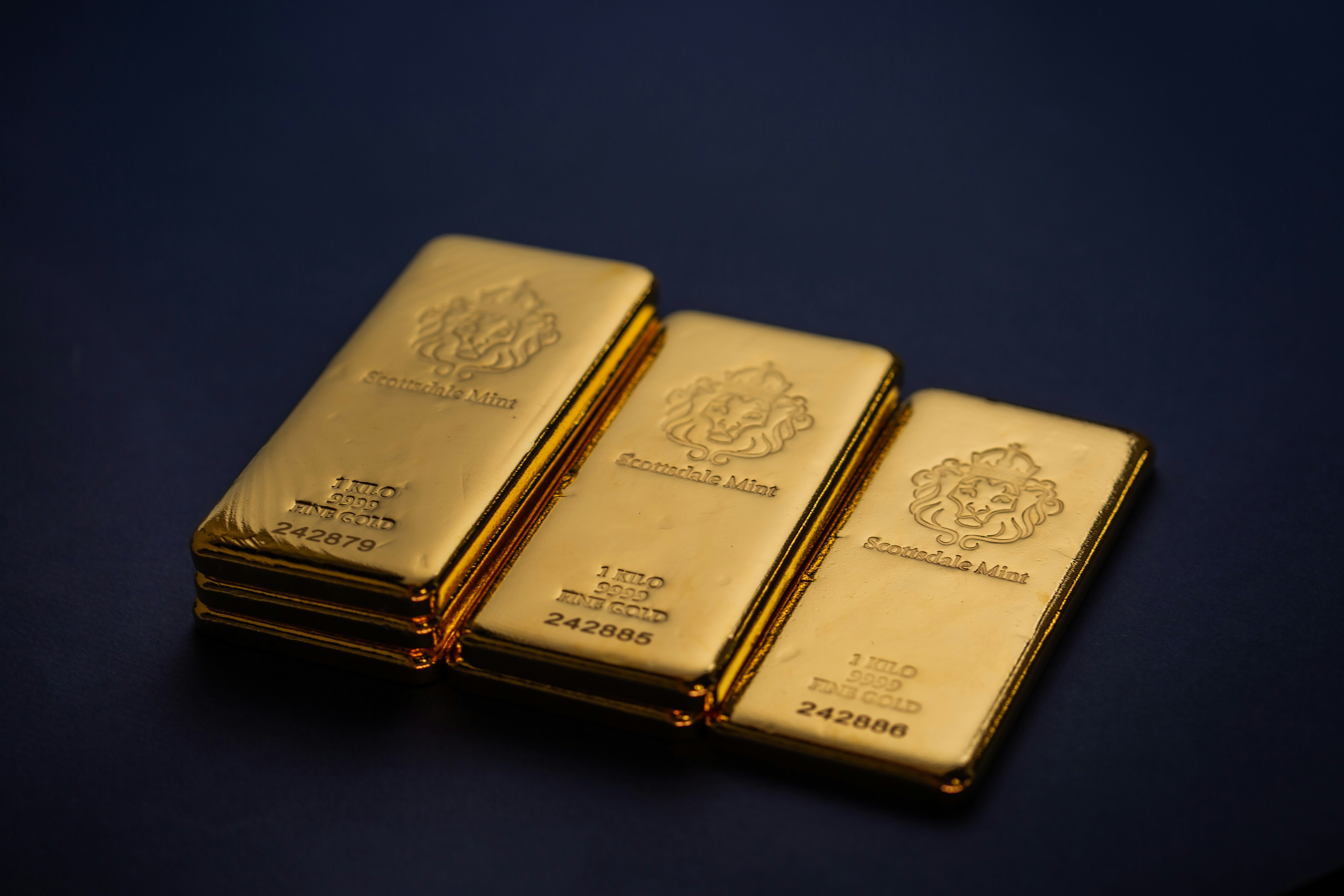 Gold bullion bars available for investment at U.S. Auction Brokers