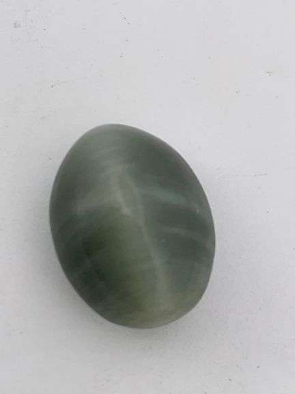 CERTIFIED 6.52 CARATS CATS EYE