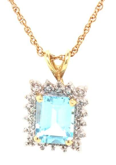 14kt Yellow gold 3ctw blue topaz and diamond accent pendant on chain