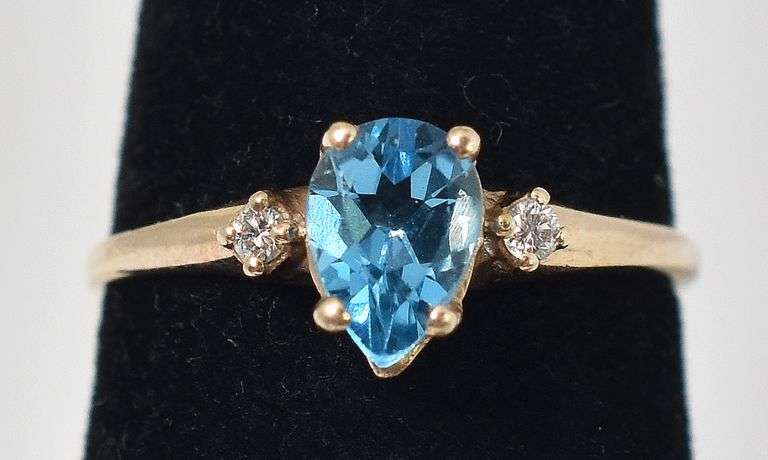 Pretty 10K Yellow Gold Blue Topaz Gemstone and Diamond Ring