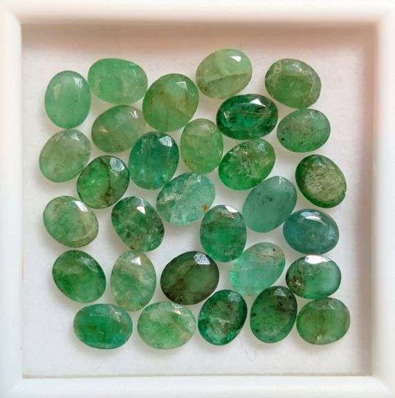 Heavy 10.43ct oval cut 30pc Zambian Emerald set!
