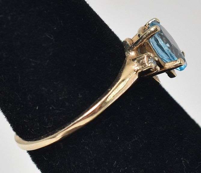 Pretty 10K Yellow Gold Blue Topaz Gemstone and Diamond Ring