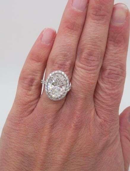 Incredible 6.77CTW Certified Diamond Halo Ring