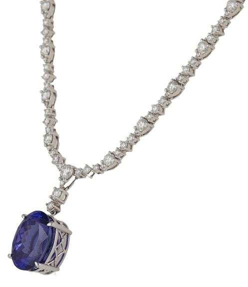 New 10.47ct Oval Tanzanite and 7.50ctw Mixed Cut Diamond Pendant Necklace in 14K
