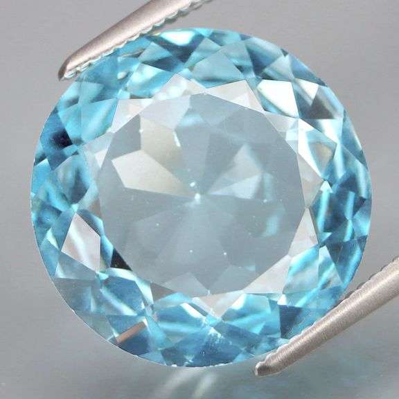 Low profile cut! Heavy flashing 10.10ct Swiss blue Topaz solitaire