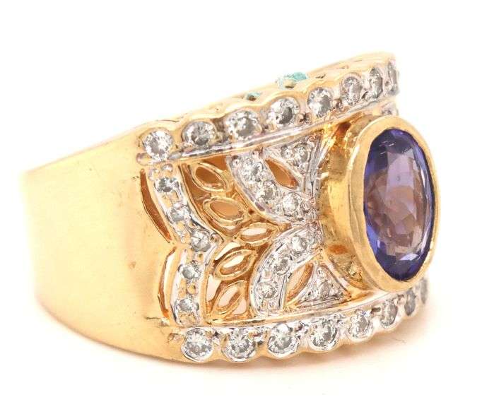 18kt Yellow gold Levian 1.21ct bezel set tanzanite and diamond open work wide ring