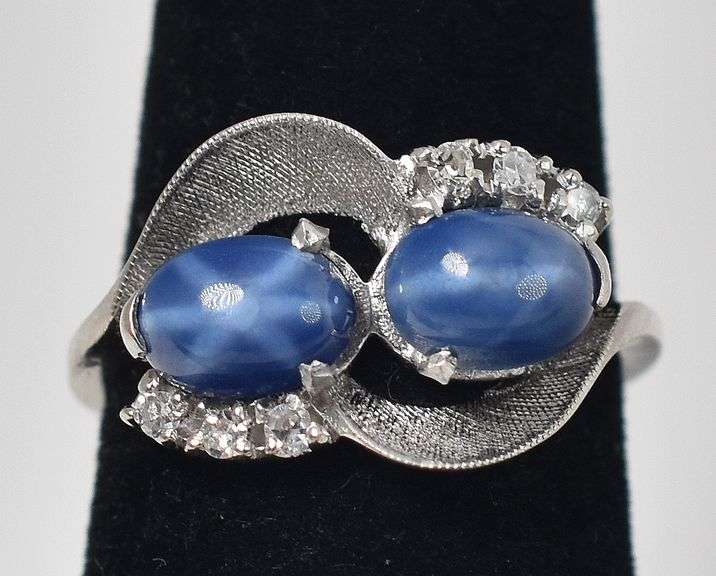 Mesmerizing 14K white Gold Star Sapphire Gemstone Ring with Diamond Accents