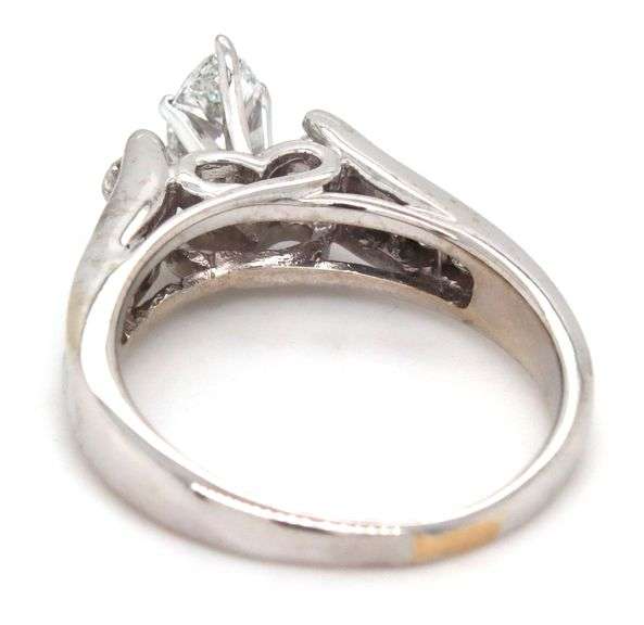 18kt White gold 0.50ct marquise and 0.45ctw round brilliant cut and princess cut engagement ring