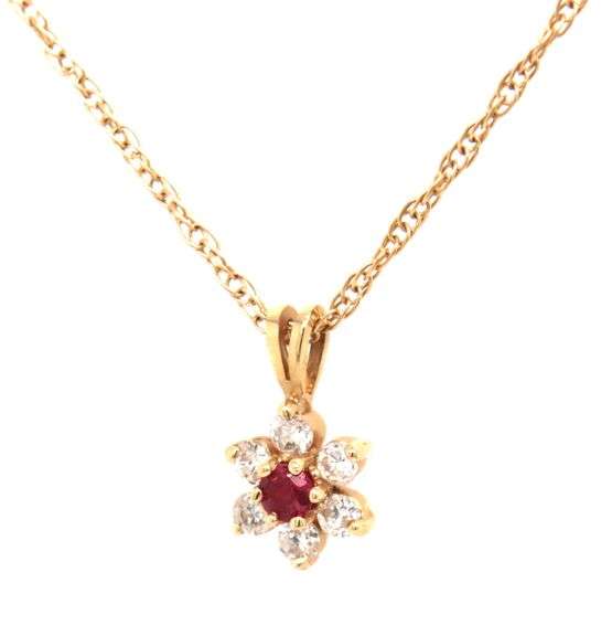 14kt Yellow gold ruby and diamond pendant on chain