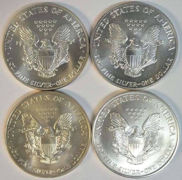 4 Better Date $1 Silver Eagles in Gem BU conditions