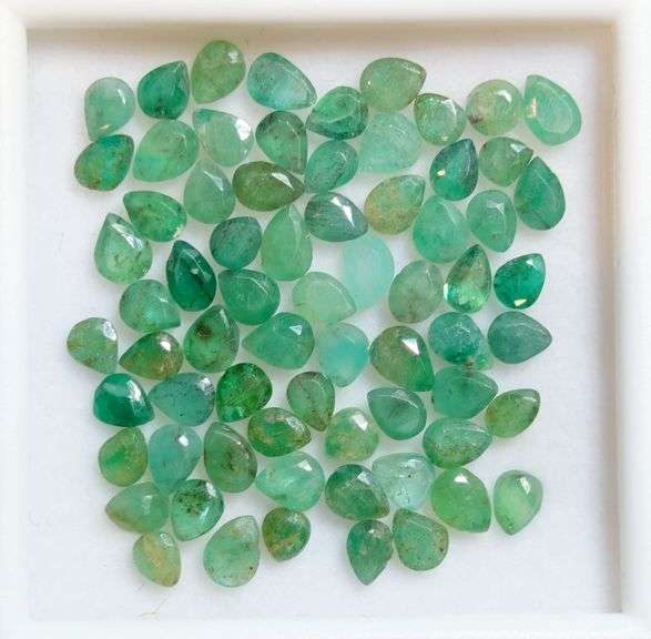 You get a beautiful mix of greens in this 6.96ct Emerald set!