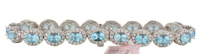 New 8.15ctw Oval Aquamarine and 2.85ctw Diamond Frame Tennis Bracelet in 14K