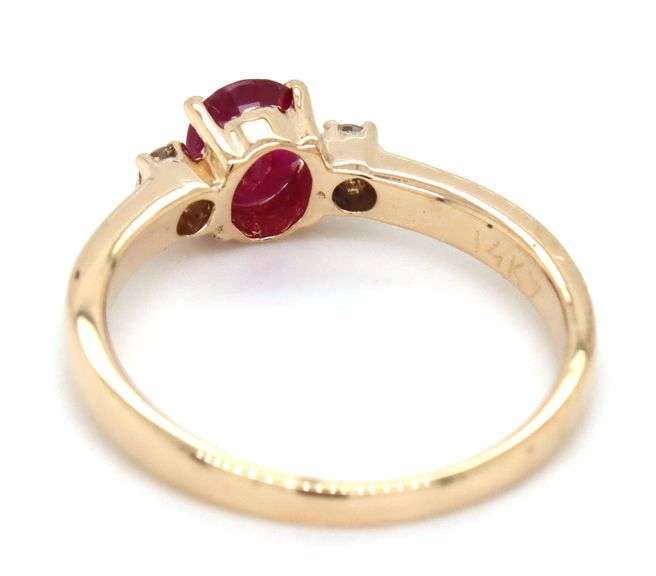 14kt Yellow gold ruby and diamond 3 stone ring