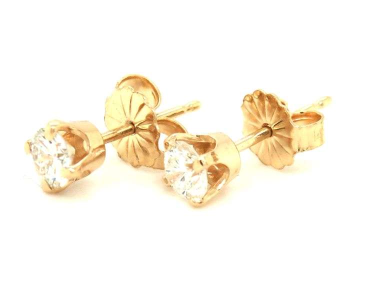 One pair of 14kt yellow gold RBC diamond stud earrings