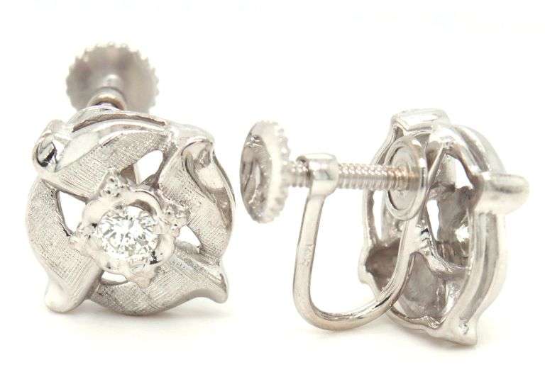 14kt White gold diamond textured flower clip on earrings