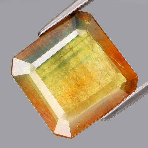 Holy cow! It a 7.40ct pendant cut bi-color Sapphire!!!