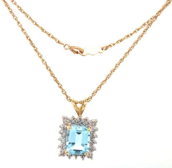 14kt Yellow gold 3ctw blue topaz and diamond accent pendant on chain