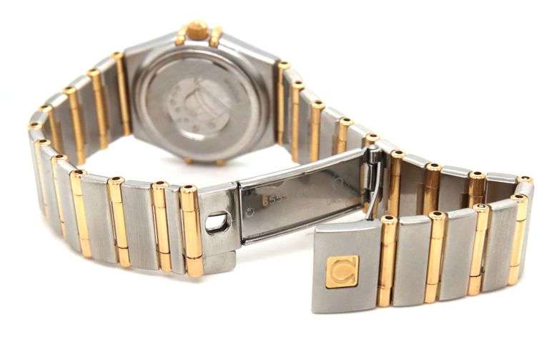 ladies Omega Constellation mother of pearl diamond dial and bezel watch