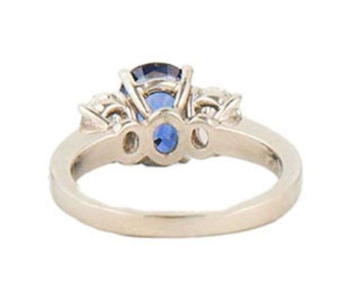 1.85ct Oval Sapphire and 0.60ctw Oval Diamond Three Stone Ring in 18K and Platinum