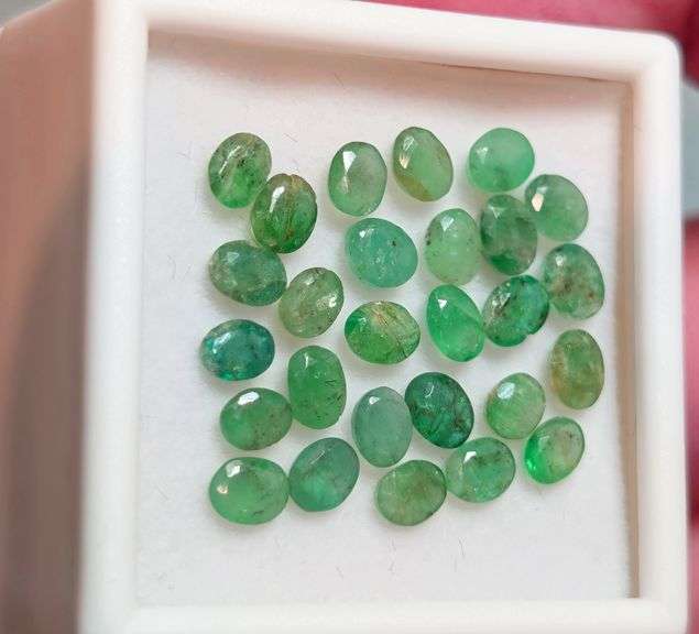 Bright emerald green 6.29ct 27pc Emerald set