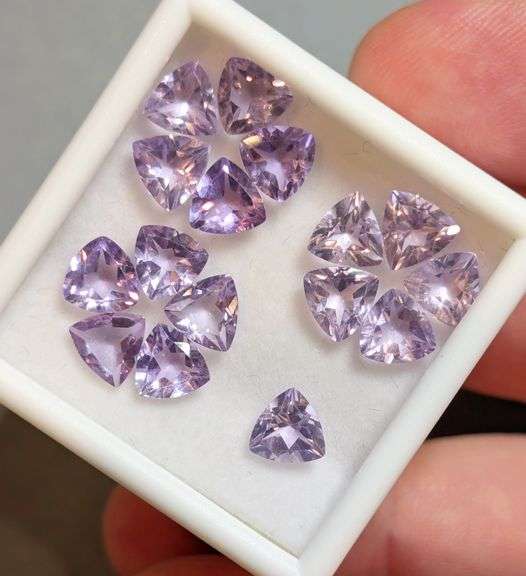 Glittering! 10.49ct high fire trillian cut Amethyst set!