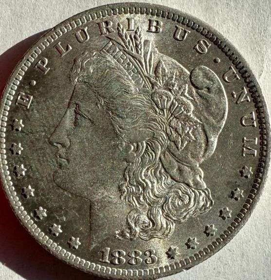 1883 O BU Morgan Dollar.