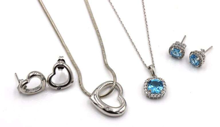 Set of 925 sterling silver 2 necklaces and 2 pair of earrings