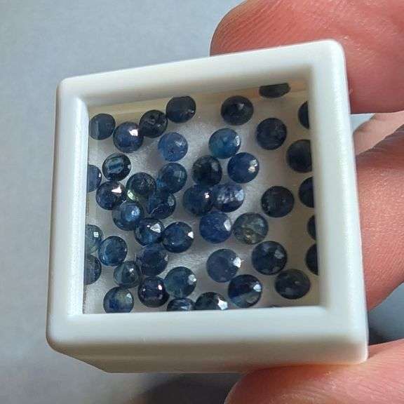 Glistening 7.51ct deep blue Sapphire set