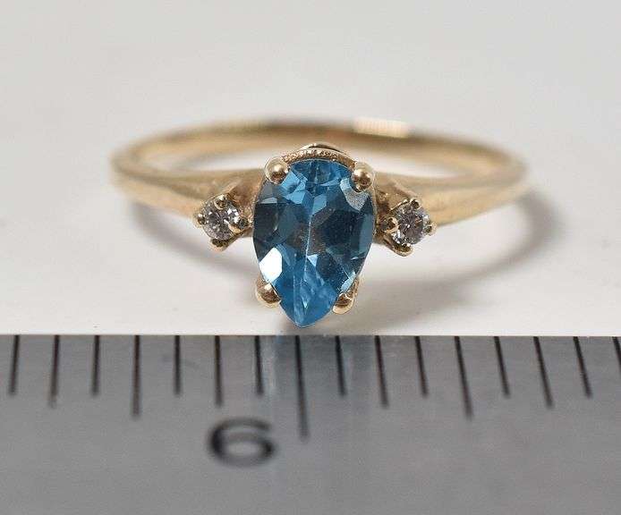 Pretty 10K Yellow Gold Blue Topaz Gemstone and Diamond Ring