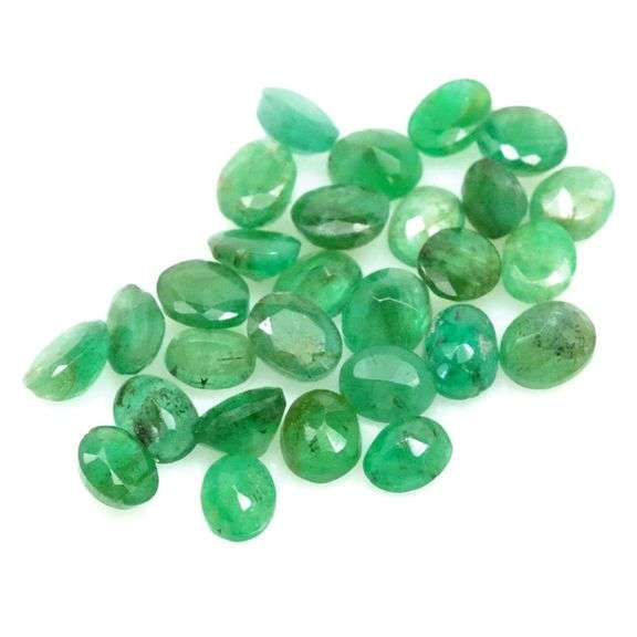 Heavy 9.56ct oval cut 28pc Zambian Emerald set!