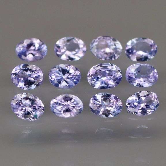Heavy flashing! Untreated! 2.05ct oval cut Tanzanite set