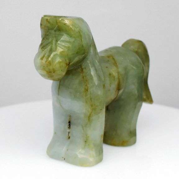 Hand cut 184.08ct untreated Burmese Jade horse carving