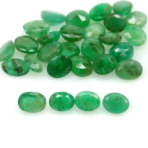 Heavy 9.56ct oval cut 28pc Zambian Emerald set!