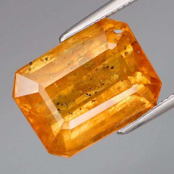 Unbelievable! 7.75ct tangerine orange emerald cut Sapphire!