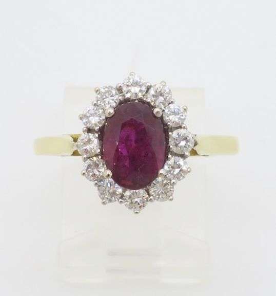 Beautiful 18k Gold Ruby & Diamond Halo ring