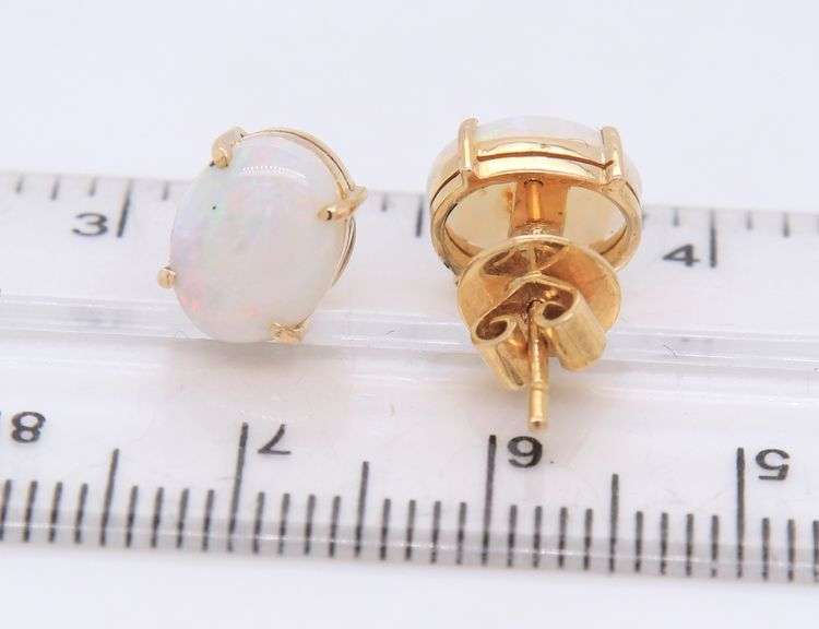 14kt Yellow gold oval opal stud earrings