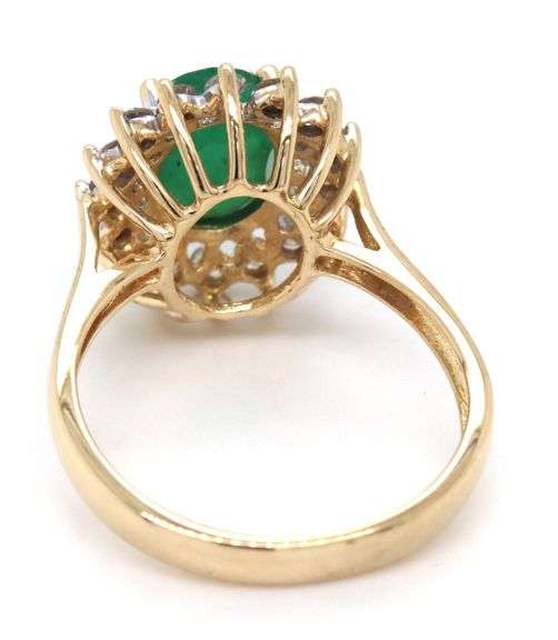 14kt Yellow gold oval emerald and diamond halo ring