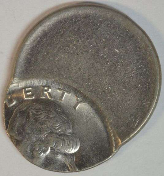 Superb undated 65% off-center Washington Quarter error in Gem BU