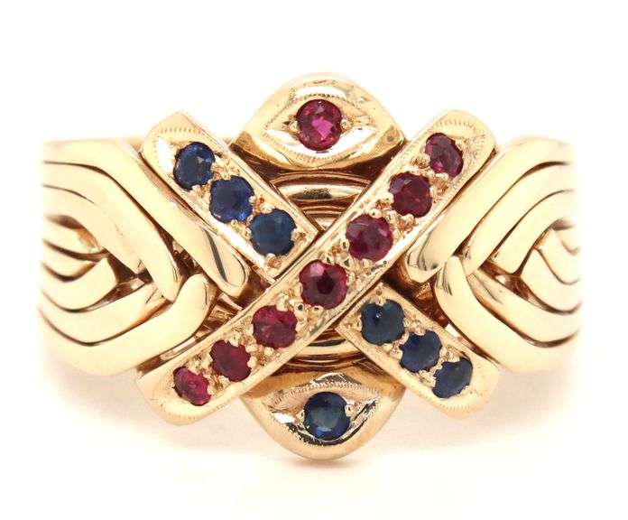 18kt Yellow gold ruby and sapphire puzzle ring