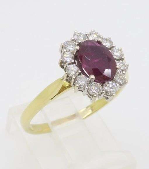 Beautiful 18k Gold Ruby & Diamond Halo ring