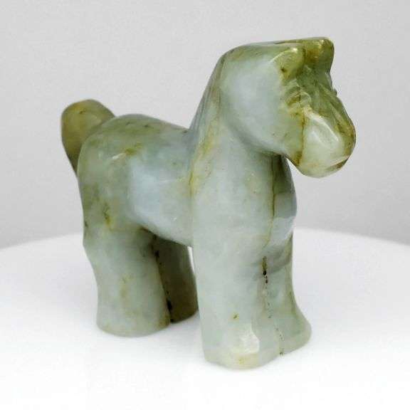 Hand cut 184.08ct untreated Burmese Jade horse carving