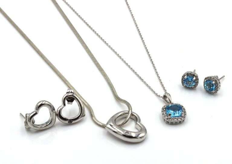 Set of 925 sterling silver 2 necklaces and 2 pair of earrings