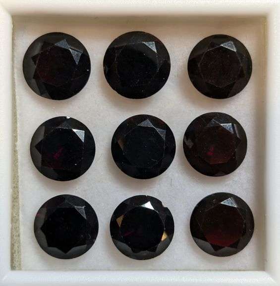 Midnight crimson 18.06ct Mozambique Garnet set