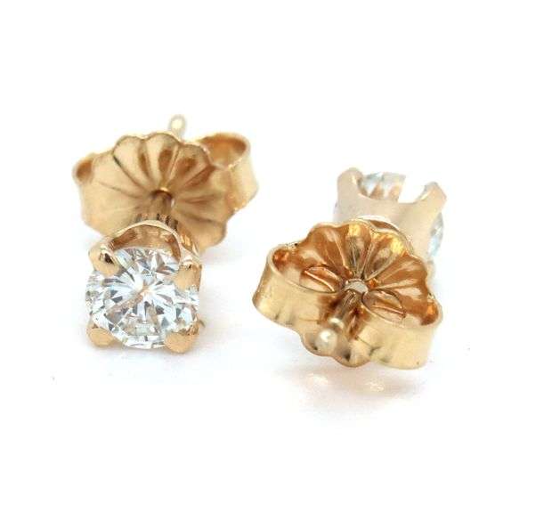 One pair of 14kt yellow gold RBC diamond stud earrings