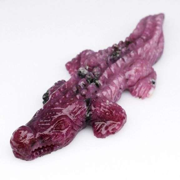 Look at this 67.46ct alligator cut from pure Ruby!
