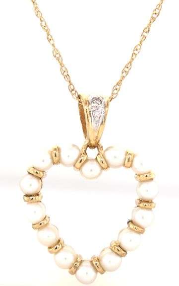 10kt Yellow gold 3mm pearl and diamond heart shaped pendant on chain