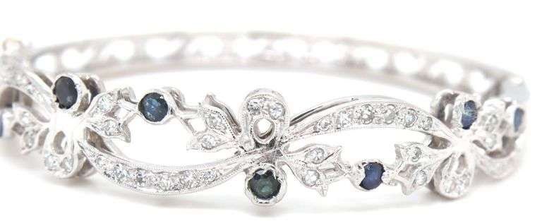 14kt White gold Retro 0.25ctw slightly included diamond and sapphire bangle bracelet