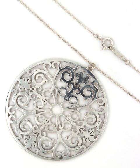 Tiffany & Co Enchant circle pendant on chain